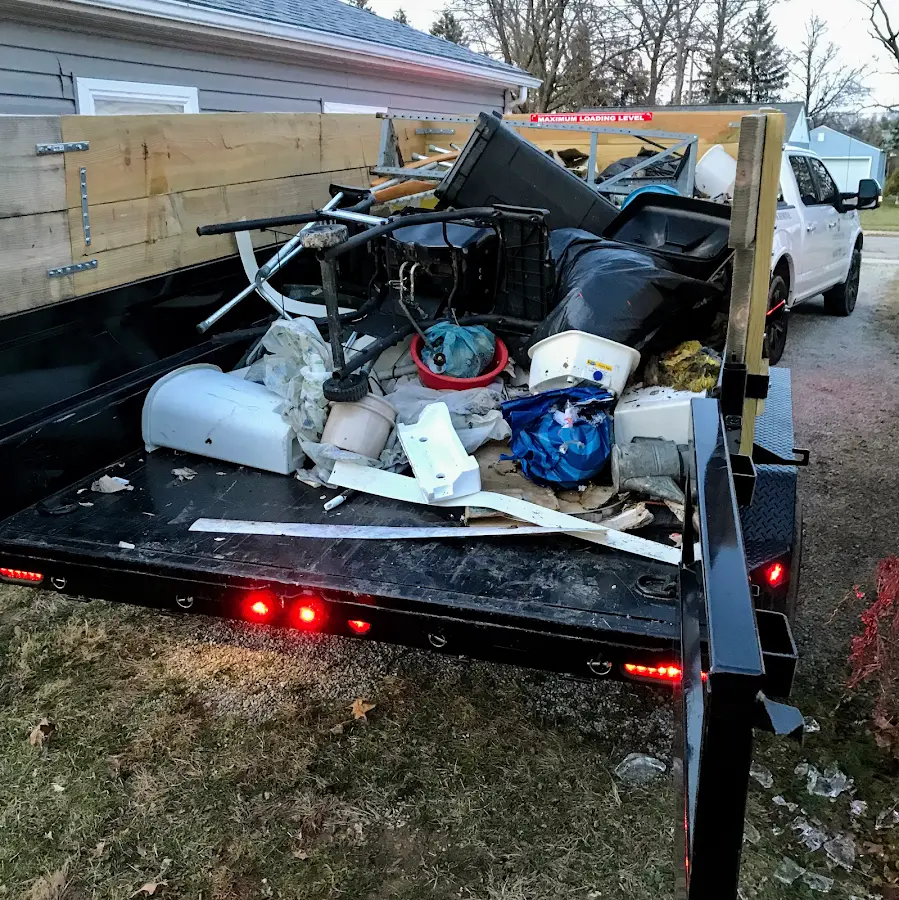 Roll-off dumpster delivered to a residential driveway in Dyer